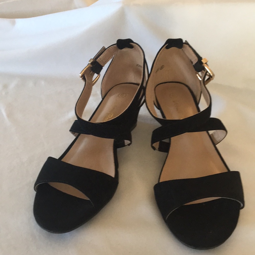 Woman’s black dress sandals